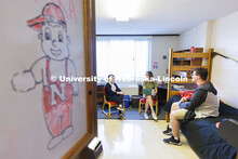 Students socializing in their dorm rooms. Housing Photo Shoot in Able Sandoz Residence Hall. Septemb
