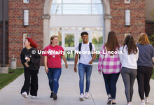 Students leaving The Courtyards Residence Hall to cross campus to classes. Housing Photo Shoot in Th