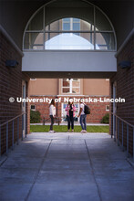 Students socialize outside the Courtyards Residence Hall. Housing Photo Shoot in The Courtyards Resi