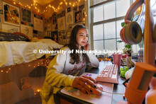 One student studying in their Courtyard Residence Hall room. Housing Photo Shoot in The Courtyards R