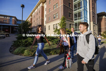 Students leaving University Suites Residence Hall to get to their classes. Housing Photo Shoot in Un