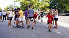 New Student Enrollment Orientation leader Hannah-Kate Kinney dashes to her first clue location at th