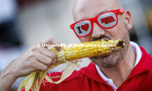 Jeff Sheldon with the Alumni Association shows off his love of Nebraska and corn. Homecoming Parade 