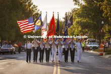 The ROTC color guard marches down R Street. Homecoming Parade and Cornstalk. September 30, 2022. 