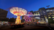 The Musical Chairs ride and the Ferris Wheel were spinning in a long exposure after the sun set Frid