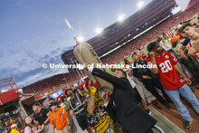 Members of the Homecoming Court get the chance to launch a hotdog with Der Viener Schlinger. Nebrask