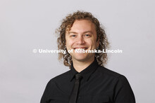 Studio portrait of Benjamin Sobel, Enrollment Coordinator for the Glenn Korff School of Music, Hixon