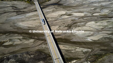 A grain semi crosses the dry Platte River at Chapman, Nebraska. The area around Chapman is in severe