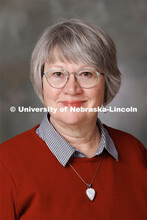Studio portrait of Leslie Reed, Public Affairs Director, Office of University Communication and Mark