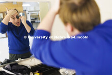 Jackson Wells applies makeup around his eyes as he costumes up to become The Gravedigger. ShakesFear