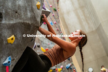 Katharine Wadas, sophomore, climbing a boulder route during the League of Extraordinary Boulderers. 