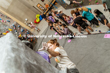 Allison Linton, senior, climbing a boulder route during the League of Extraordinary Boulderers. Leag