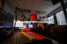 Ryan Luetkemeyer, a sophomore from St. Louis, does the afternoon broadcast from the booth at KRNU. N