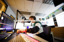 Ryan Luetkemeyer, a sophomore from St. Louis, does the afternoon broadcast from the booth at KRNU. N