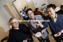 Yuris Dzenis (from left), R. Vernon McBroom Professor in Mechanical and Materials Engineering, Jongw