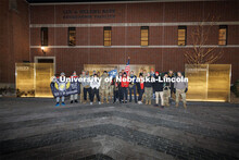 Nebraska students and veterans march from Memorial Stadium Wednesday morning. "The Things They Carry