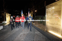 Ruck Marchers begin the march going through the Veterans Tribute. From left is Midshipman Abby Thibo