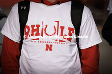 A fan wears a Husker shirt supporting the new coach, Matt Rhule. Husker head football coach Matt Rhu