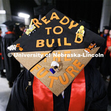 Construction Management graduate Mario Esquivel and his decorated mortar board. Winter Undergraduate