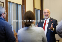 Charles Stoltenow, Dean and Director of Nebraska Extension, talks with staff and coworkers in Agricu