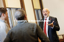 Charles Stoltenow, Dean and Director of Nebraska Extension, talks with staff and coworkers in Agricu