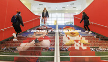 Students walk up the stairs in the Nebraska Union. City Campus. January 25, 2023. 