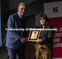 Chancellor Ronnie Green awards Dulce Garcia the Fulfilling the Dream Campus Award. The MLK Commemora