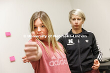 Dr. Kate Higgins, an Athletic Neuropsychologist with Husker Athletics, performs a Visual Motion Sens