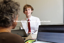 Sarah Charles and Explore Center Advisor helps a student. Explore Center. February 7, 2023. 