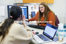 Alex Dudley, an Academic Advisor at the Explore Center helps a student. February 7, 2023. 