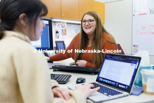 Alex Dudley, an Academic Advisor at the Explore Center helps a student. February 7, 2023. 