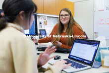 Alex Dudley, an Academic Advisor at the Explore Center helps a student. February 7, 2023. 