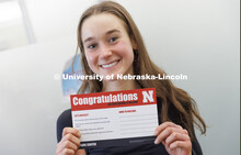 Alexis Dent, a freshman, is all smiles after working with the Explore Center’s Elisa Heide to find
