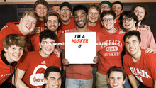 Brandon McMiller, a sophomore in broadcasting, is surrounded by his fellow Bathtub Dogs. February 8,