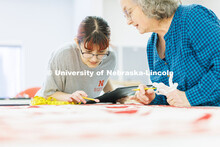 Inas Hskan, a sophomore in Textiles, Merchandizing & Fashion Design and quilt center student worker,