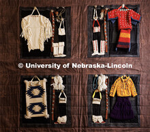 A quilt titled “Missing and Murdered Indigenous Women Since 1492” includes three-dimensional pie
