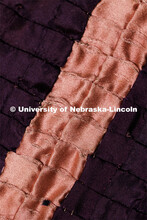 A closeup of  the Ruth and Naomi Quilt sewn by Charles Pratt in the 1930s. The quilt is comprised of
