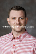 Studio portrait of Calvin DeVries, 4-H Extension Educator. Portraits of Extension, IANR and CASNR ed