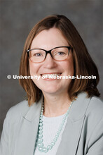 Studio portrait of Tracy Pracheil, 4-H Youth Development Extension Educator. Portraits of Extension,