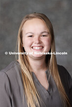 Studio portrait of Alexis Schmidt, 4-H Extension Assistant. Portraits of Extension, IANR and CASNR e