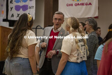 Chancellor Ronnie Green talks to students during Huskerthon. University of Nebraska–Lincoln studen