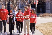 New Student Orientation Leader Jacob Vanderford leads a group across campus. NSE Leaders walking on 