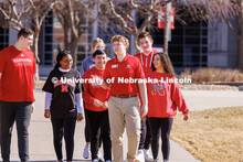 New Student Orientation Leader Jacob Vanderford leads a group across campus. NSE Leaders walking on 