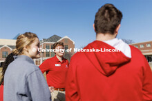 New Student Orientation Leader Jacob Vanderford leads a group across campus. NSE Leaders walking on 