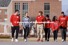 New Student Orientation Leader Jacob Vanderford leads a group across campus. NSE Leaders walking on 