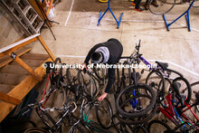 Engineering student Jacob Dalton works on repairing a bike at Lincoln Bike Kitchen Repair. The Bike 