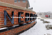 The Nebraska sign in front of the Van Brundt Visitor's Center is surrounded by snow. Spring Break sn