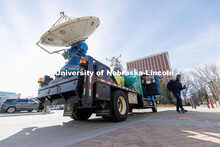 Students hop out of The Doppler on Wheels, part of the Flexible Array of Radars and Mesonets operate