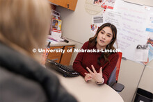 Academic Advisor Daniela Martinez advises a student. Explore Center photo shoot. March 22, 2023. 