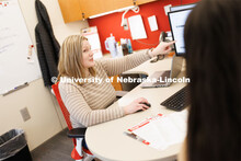 Academic Advisor Bethany Heaney works with a student. Explore Center photo shoot. March 22, 2023. 